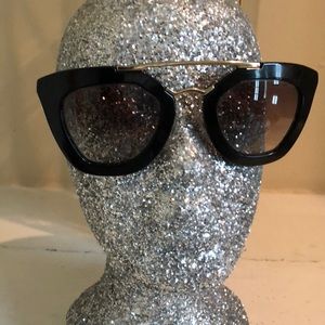 Prada Black and Gold Rim Sunglasses
